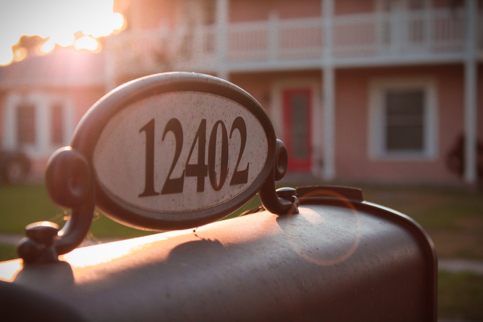 A mailbox with an address number on it